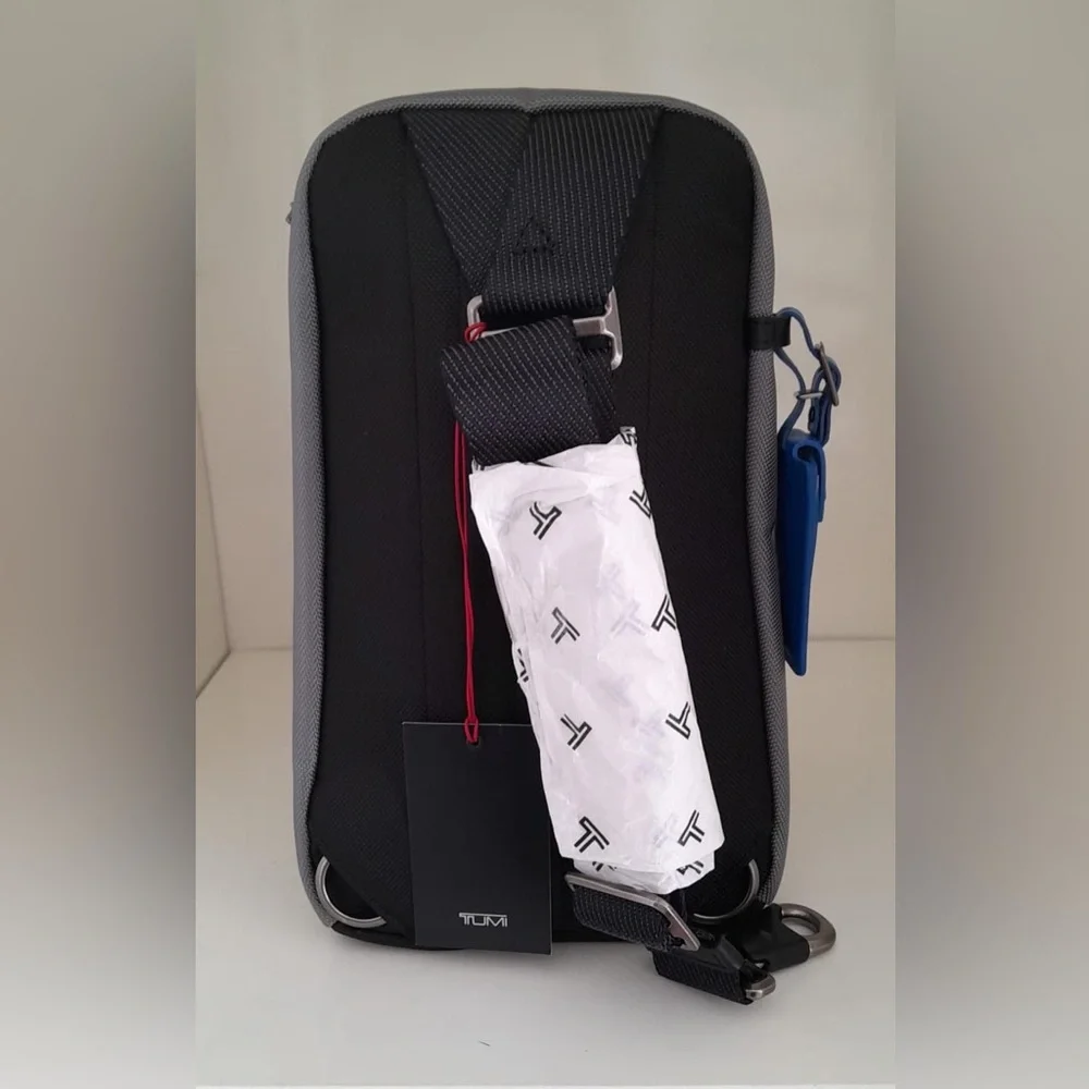 NWT Tumi FIFE Slim Sling Bag Dark Gray Blue